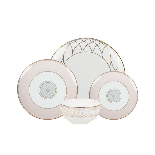 Blush pink and gold ceramic dinnerware set with plates and soup bowls in 16-piece collection.