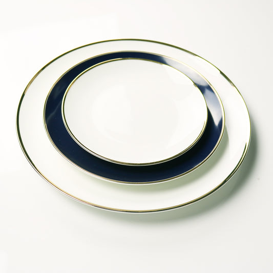 Set of 4 fine bone china bread and butter plates with narrow 14k gold rims from the Le Sofra Collection.
