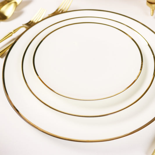 Elegant 16-piece white porcelain dinnerware set with a slim gold rim and glossy finish.